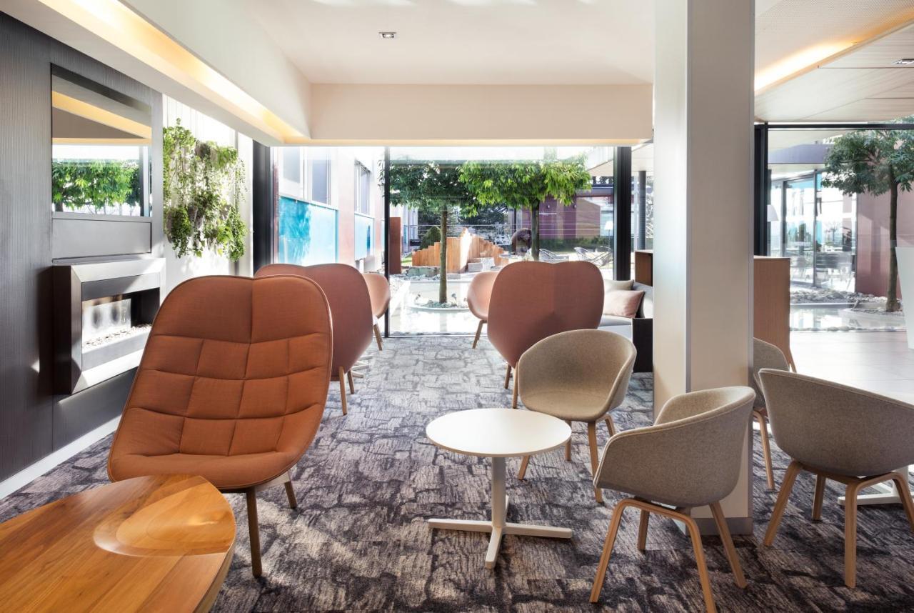 Novotel Lausanne Bussigny Криссье Экстерьер фото