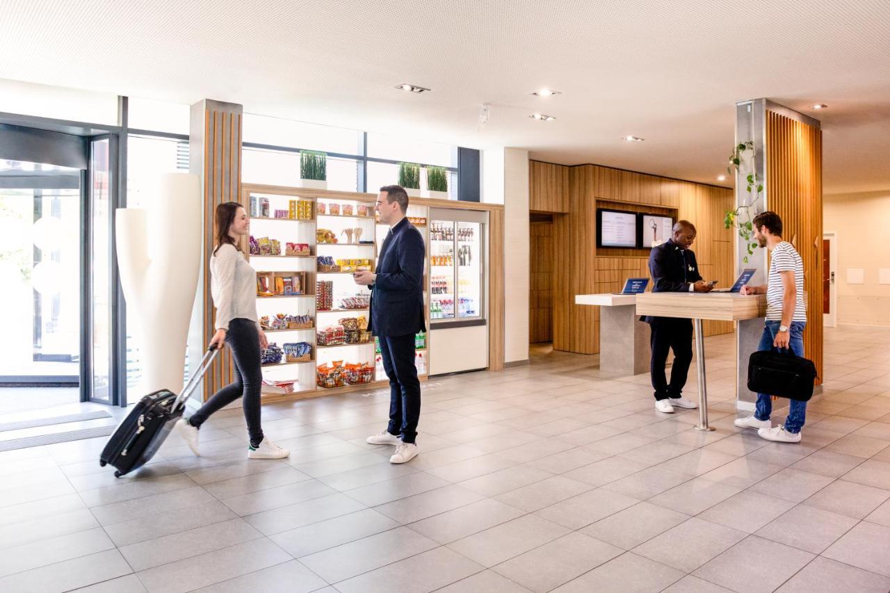 Novotel Lausanne Bussigny Криссье Экстерьер фото